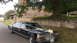 Cadillac Limousine Wedding car. Click for more information.