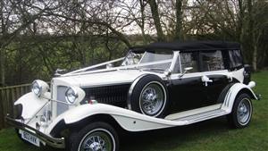 Beauford 4 Door Long Bodied Wedding car. Click for more information.