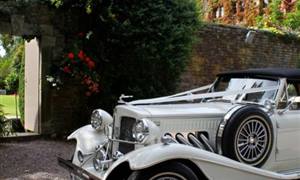 Beauford 4 Door Long Bodied Wedding car. Click for more information.