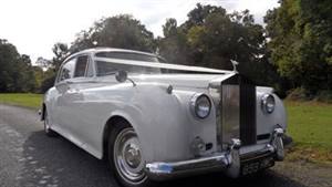 Rolls Royce 1962 Silver Could II LWB Wedding car. Click for more information.
