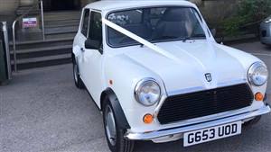 Mini 1990 City E Wedding car. Click for more information.