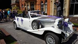 Beauford 4 Door Long Bodied Wedding car. Click for more information.