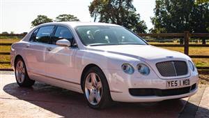 Bentley Continental Flying Spur Wedding car. Click for more information.