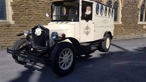 Fleur De Llys Vintage Coach Wedding car. Click for more information.