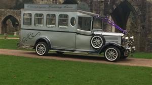 Asquith Vintage Coach Wedding car. Click for more information.