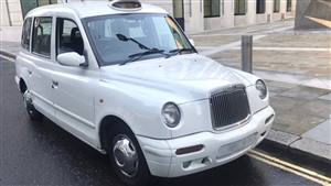 London Taxi TX Wedding car. Click for more information.