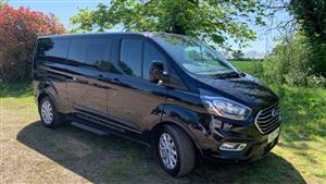 Ford Minibus Wedding car. Click for more information.