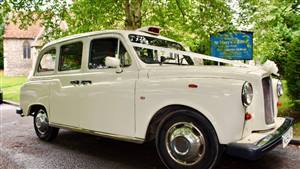 Fairway London Taxi Wedding car. Click for more information.