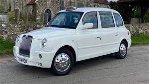 London Taxi TX4 Elegance Wedding car. Click for more information.