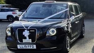 Black Cab Hybrid TX LEVC Wedding car. Click for more information.