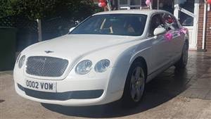 Bentley Flying Spur Wedding car. Click for more information.