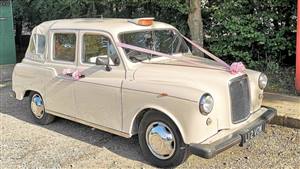 Unique London Cab Wedding car. Click for more information.