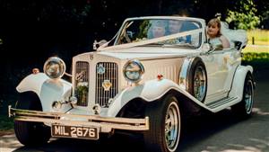 Beauford Convertible Wedding car. Click for more information.