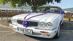 Jaguar XJ8 LWB Wedding car. Click for more information.