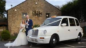 London Taxi TX1 (Betty) Wedding car. Click for more information.