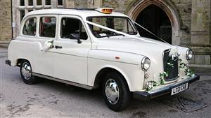 London Taxi LTI Fairway Wedding car. Click for more information.