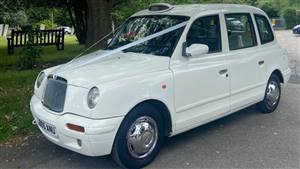 London Taxi TX Wedding car. Click for more information.
