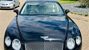 Bentley Flying Spur Wedding car. Click for more information.